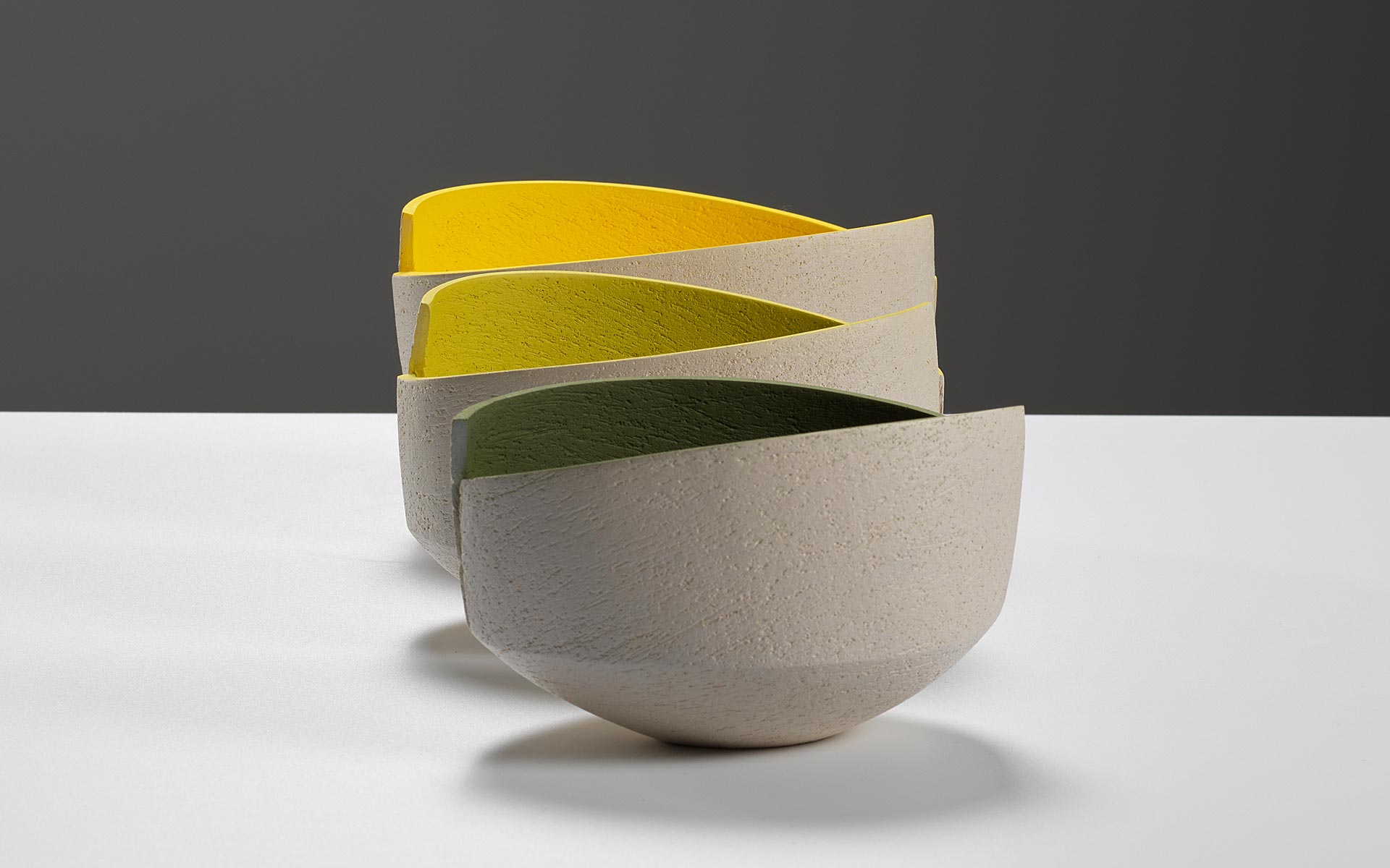 Group of cut and altered bowls